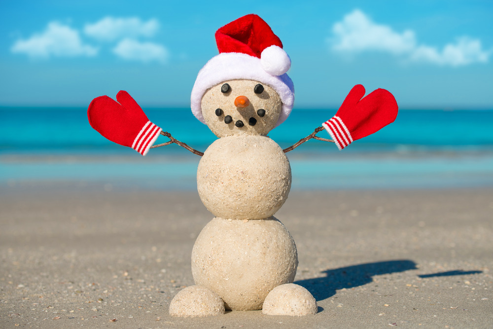 Florida Snowman in red Santa hat and mittens or gloves