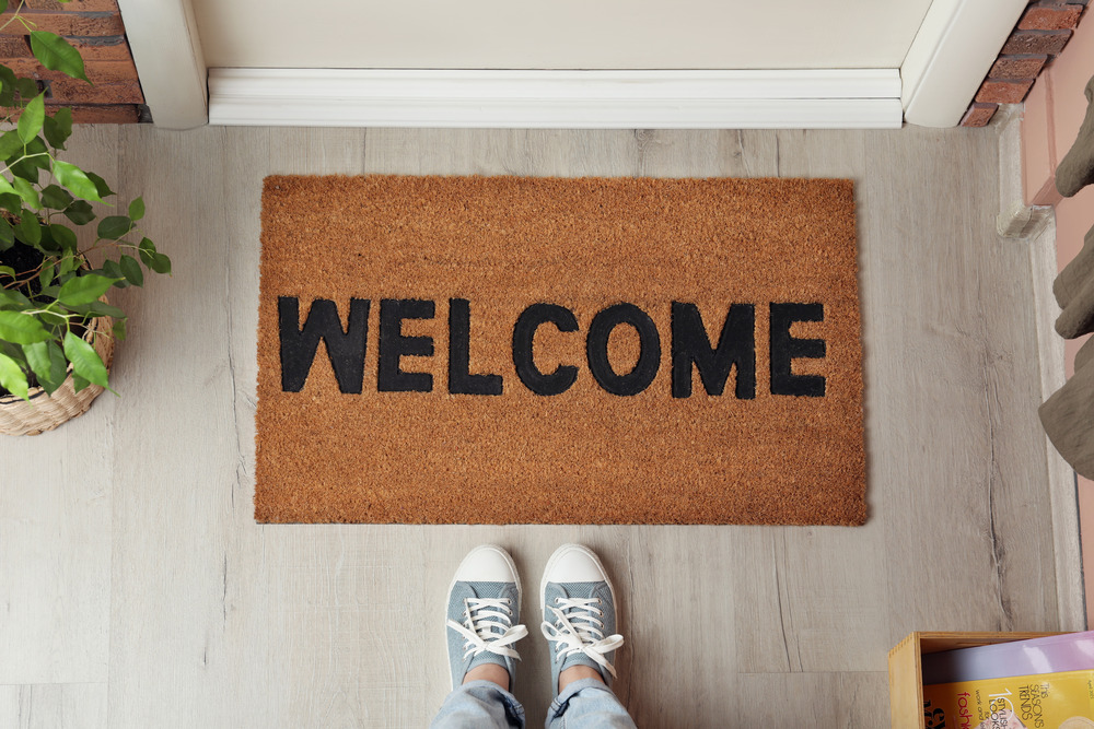 welcome Doormat outside the entrance of a home