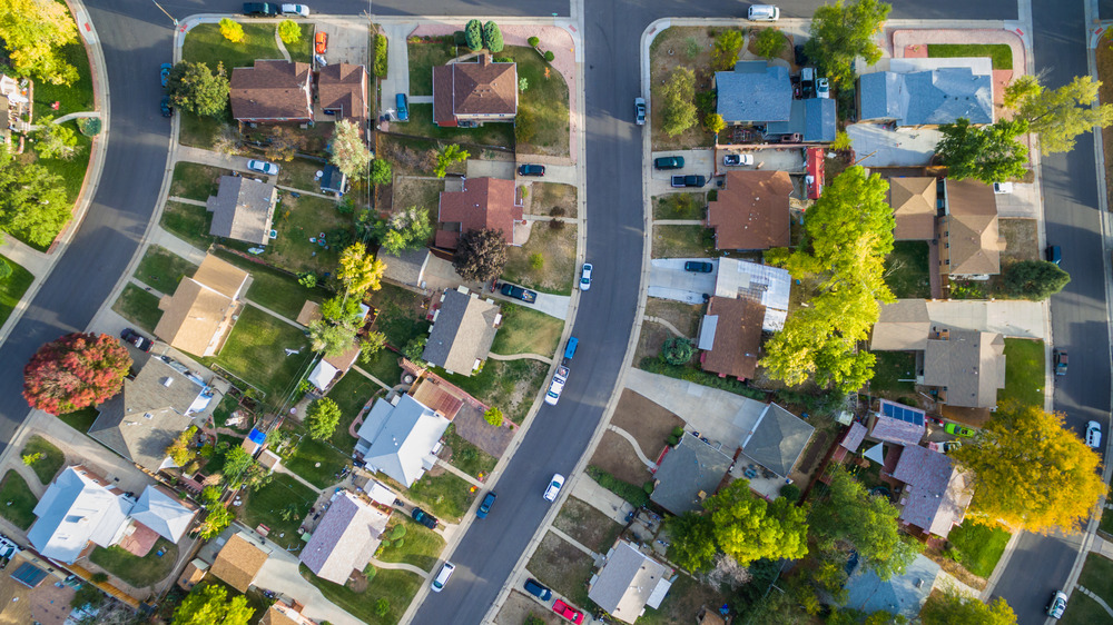build vs buy a house in different locations ariel view of a Residential neighborhood of new construction homes